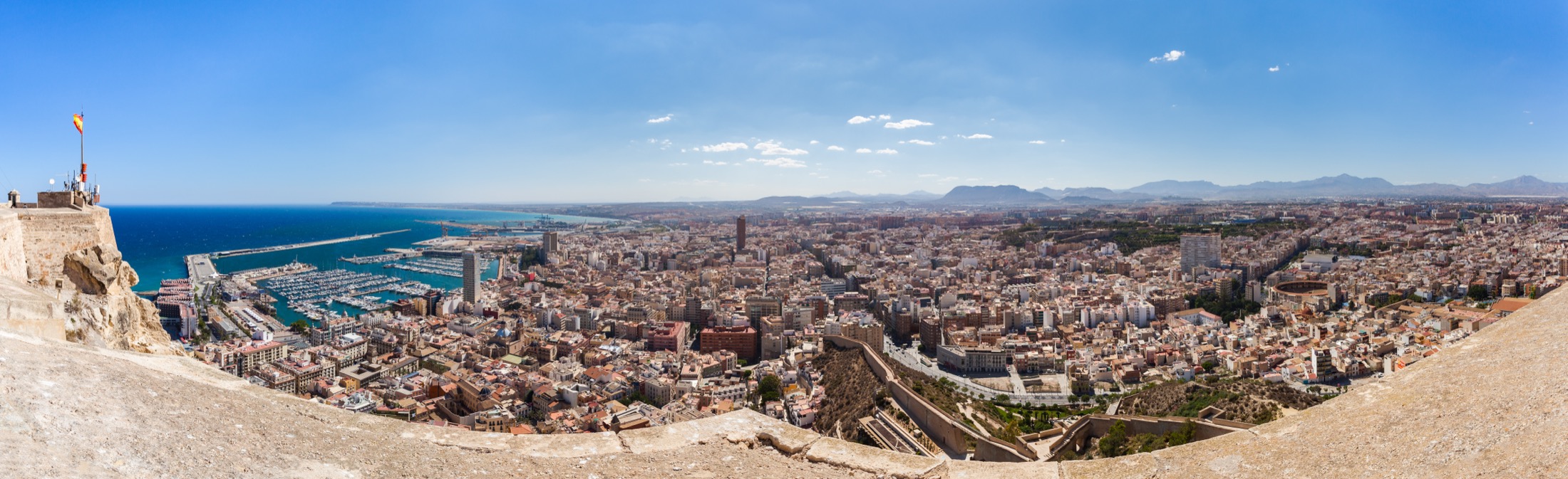Wide elevated view over Alicante and the waterfront from the castle.