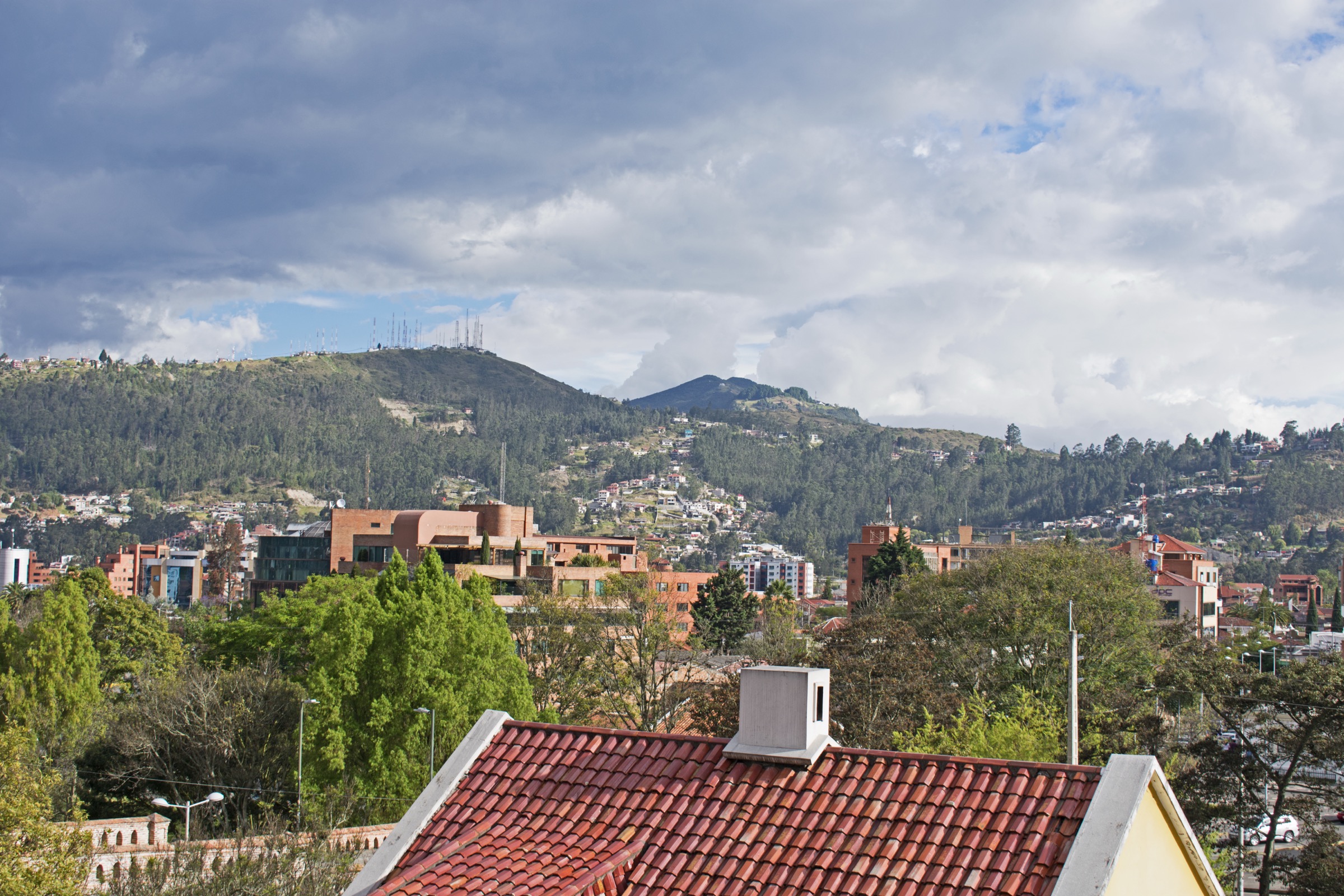 View across Cuenca from the top of Bajada de Todos Santos on a bright day.