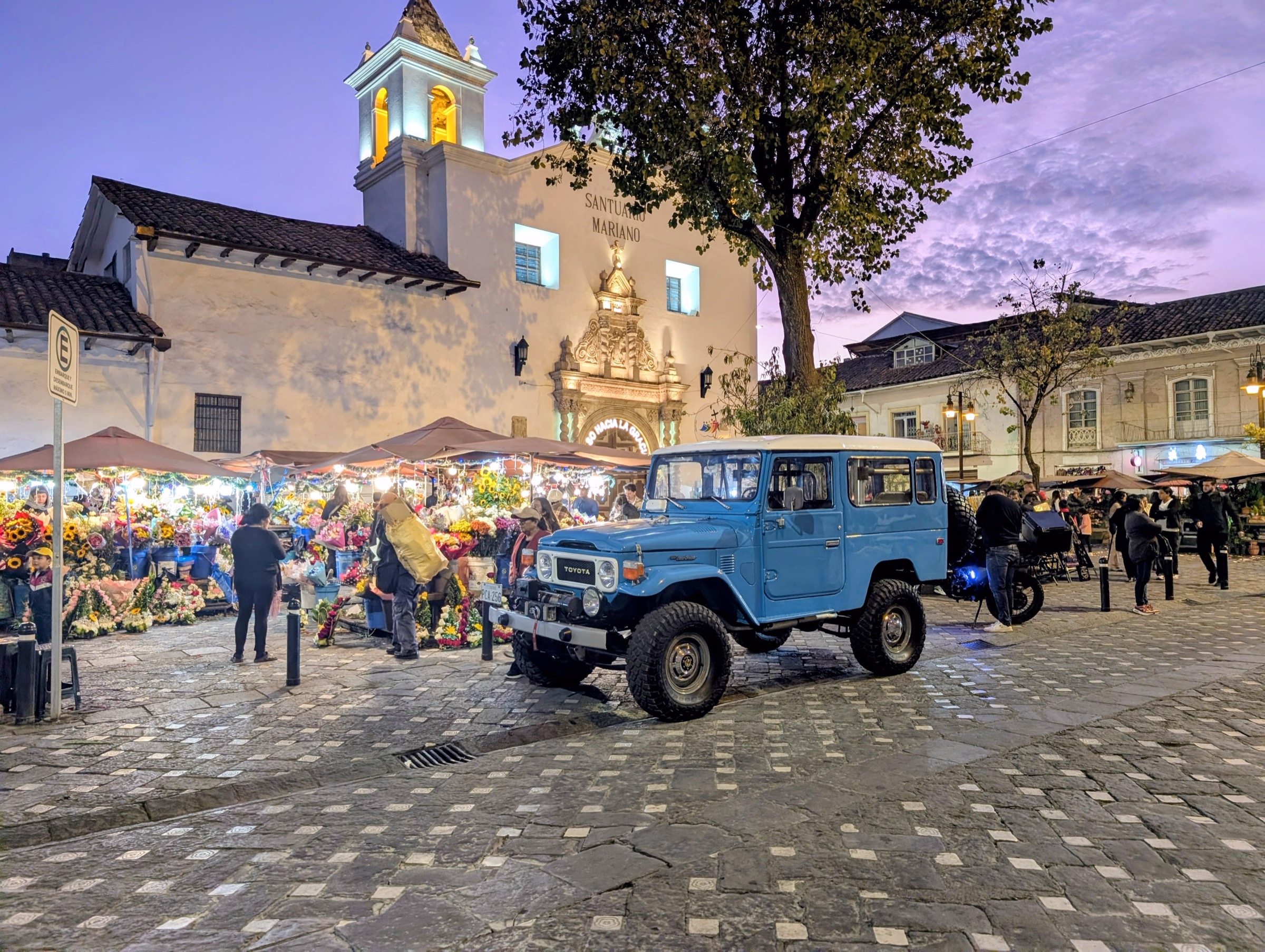 Sunset view near Plaza de las Flores in Cuenca with cathedral area buildings and warm evening light.