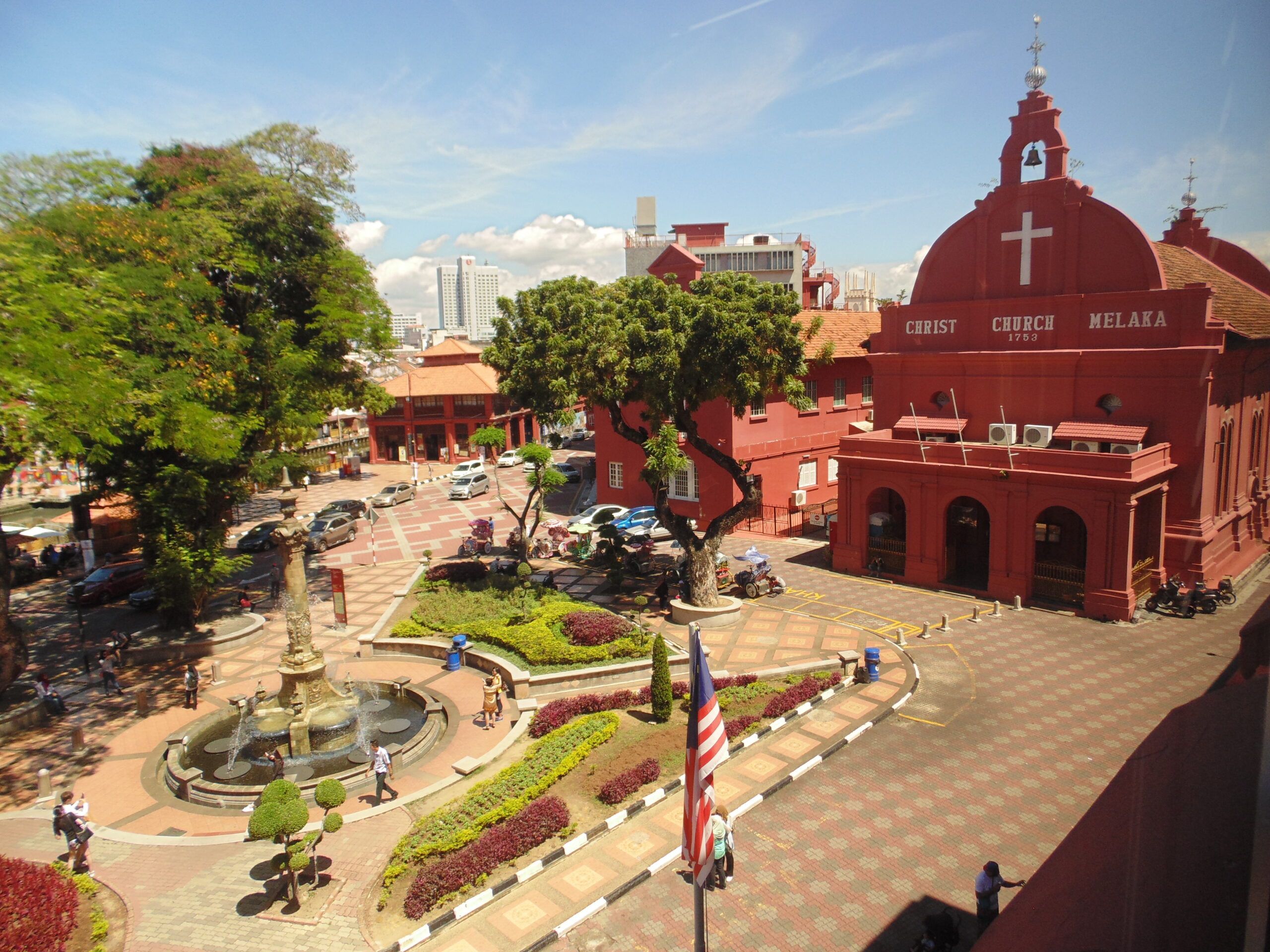 Compact heritage-city scene in Malacca, Malaysia, showing a smaller and slower urban setting.
