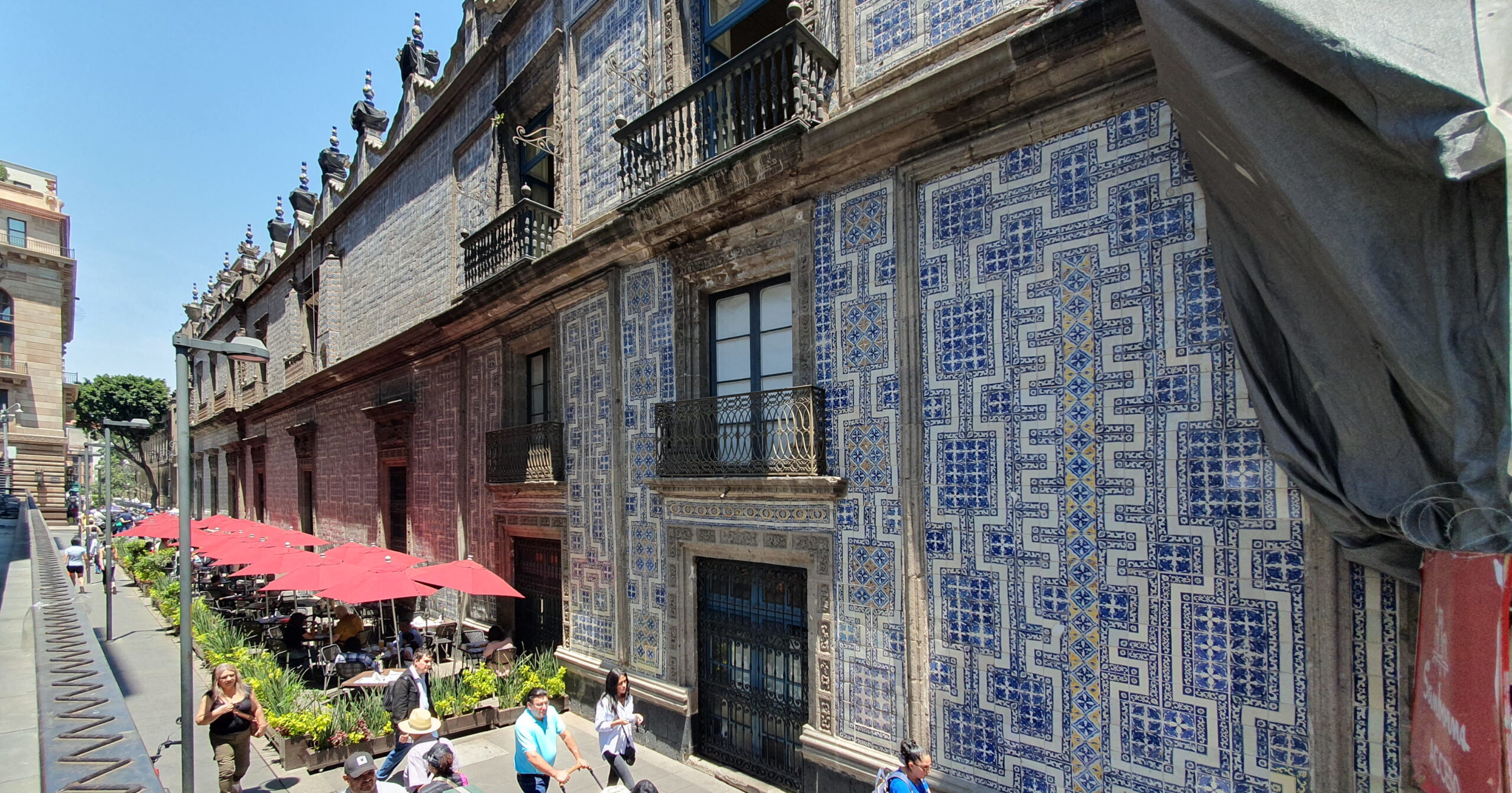 Historic tiled facade of Casa de los Azulejos in central Mexico City.