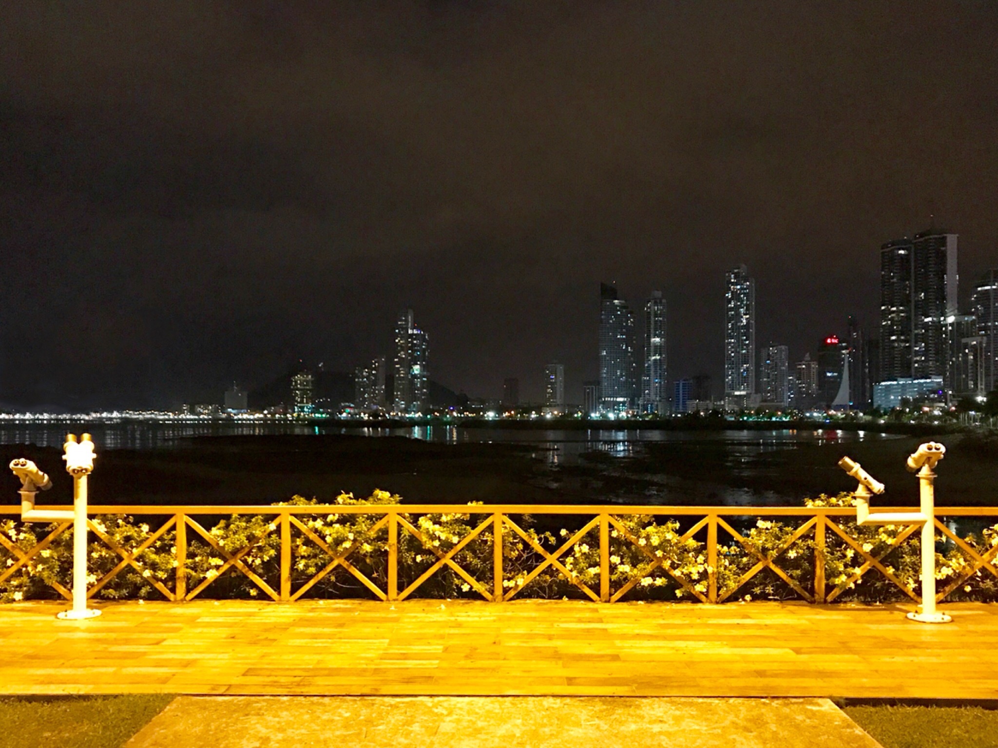 Waterfront section of Panama City along the Cinta Costera with roadway, skyline, and bay views.
