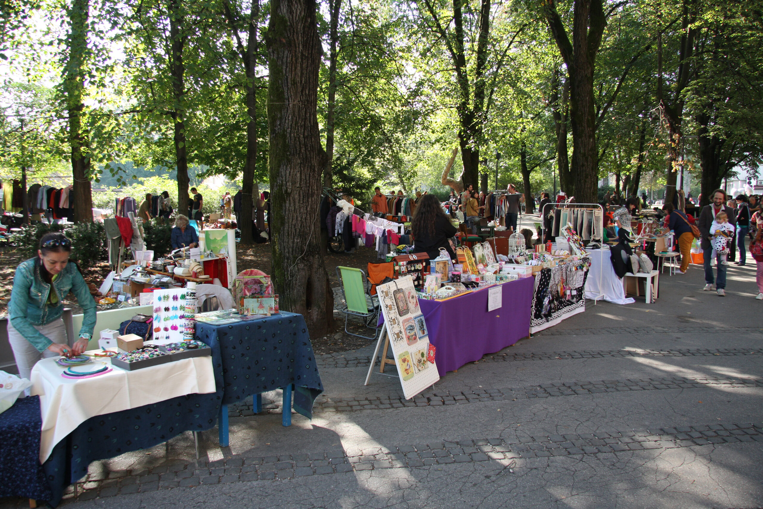 Saturday market in a smaller European city, illustrating daily errands and social surface beyond the famous capital cities.
