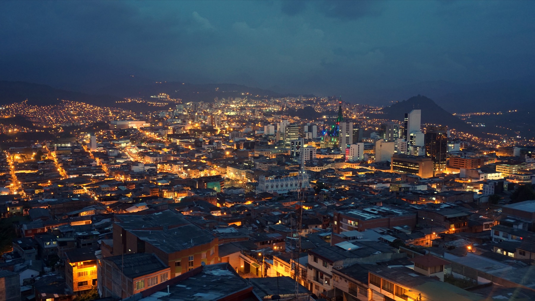 Dawn view over Manizales, Colombia, a smaller Andean city with urban services and a calmer scale than Colombia's largest metros.