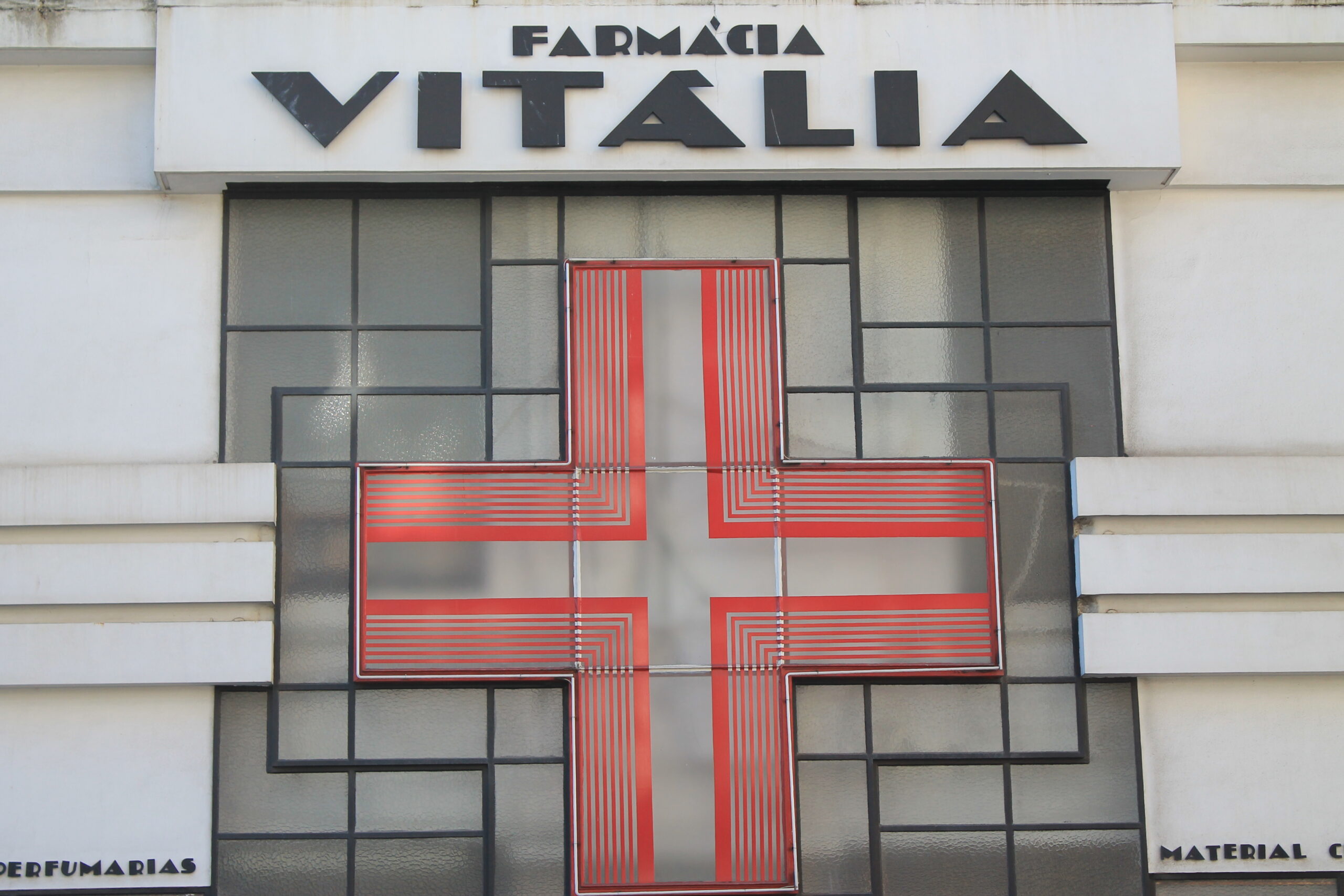 A pharmacy storefront that can be saved as part of first-week errands abroad.