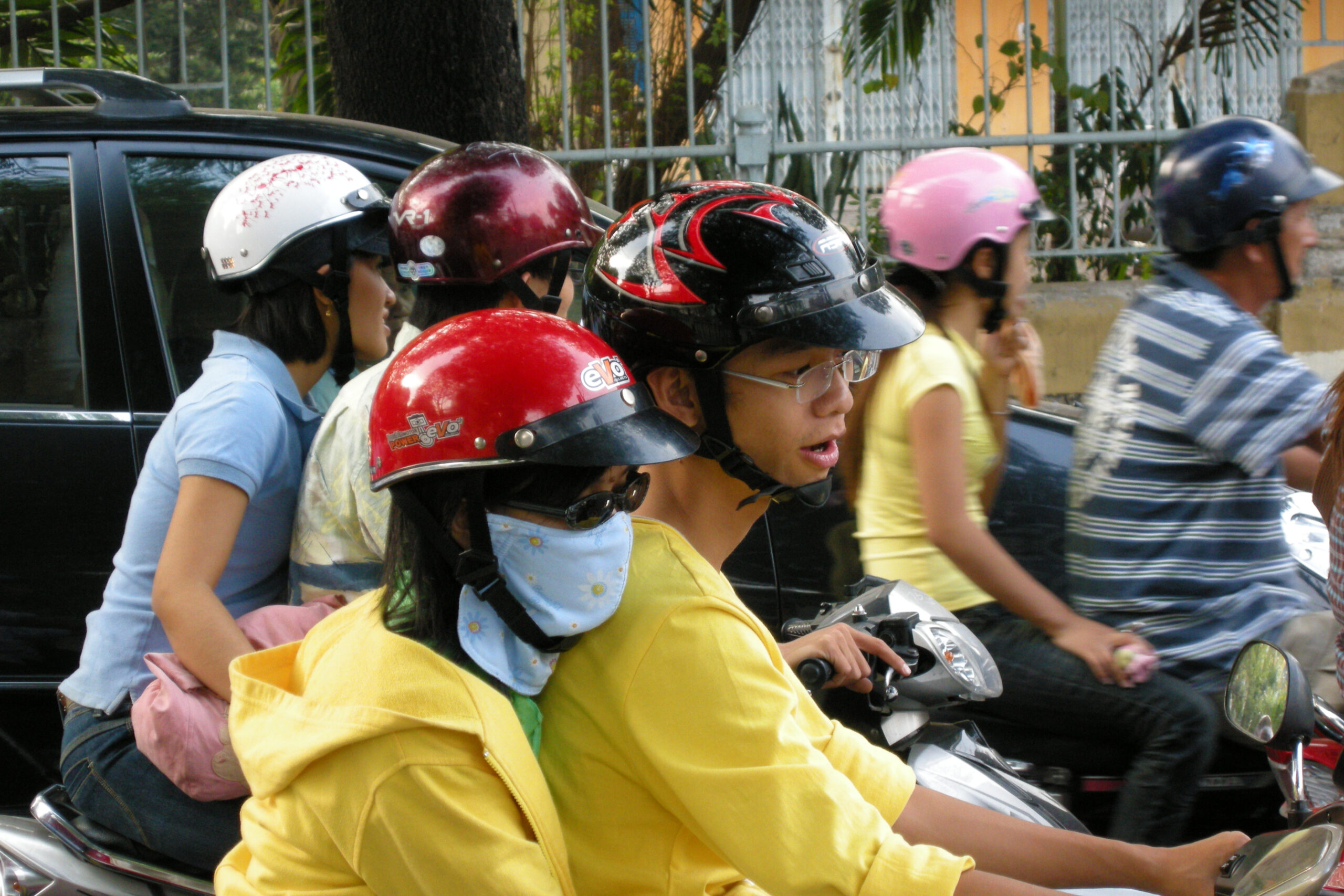 Heavy traffic in Ho Chi Minh City, Vietnam, showing why location and ride-hailing habits can change a monthly budget.