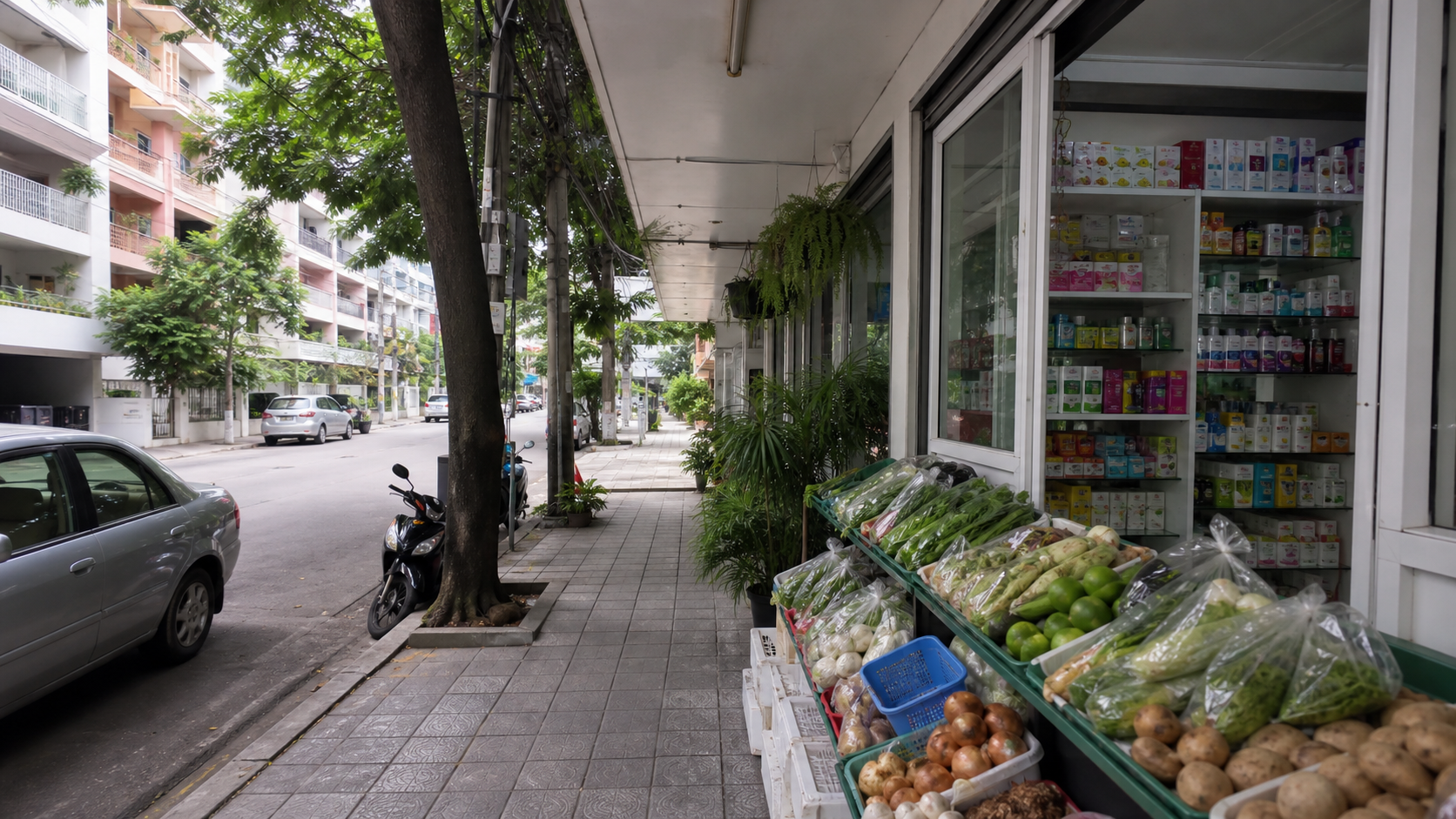 Illustrative Bangkok neighborhood sidewalk beside a produce display and small pharmacy window, with apartment buildings nearby.