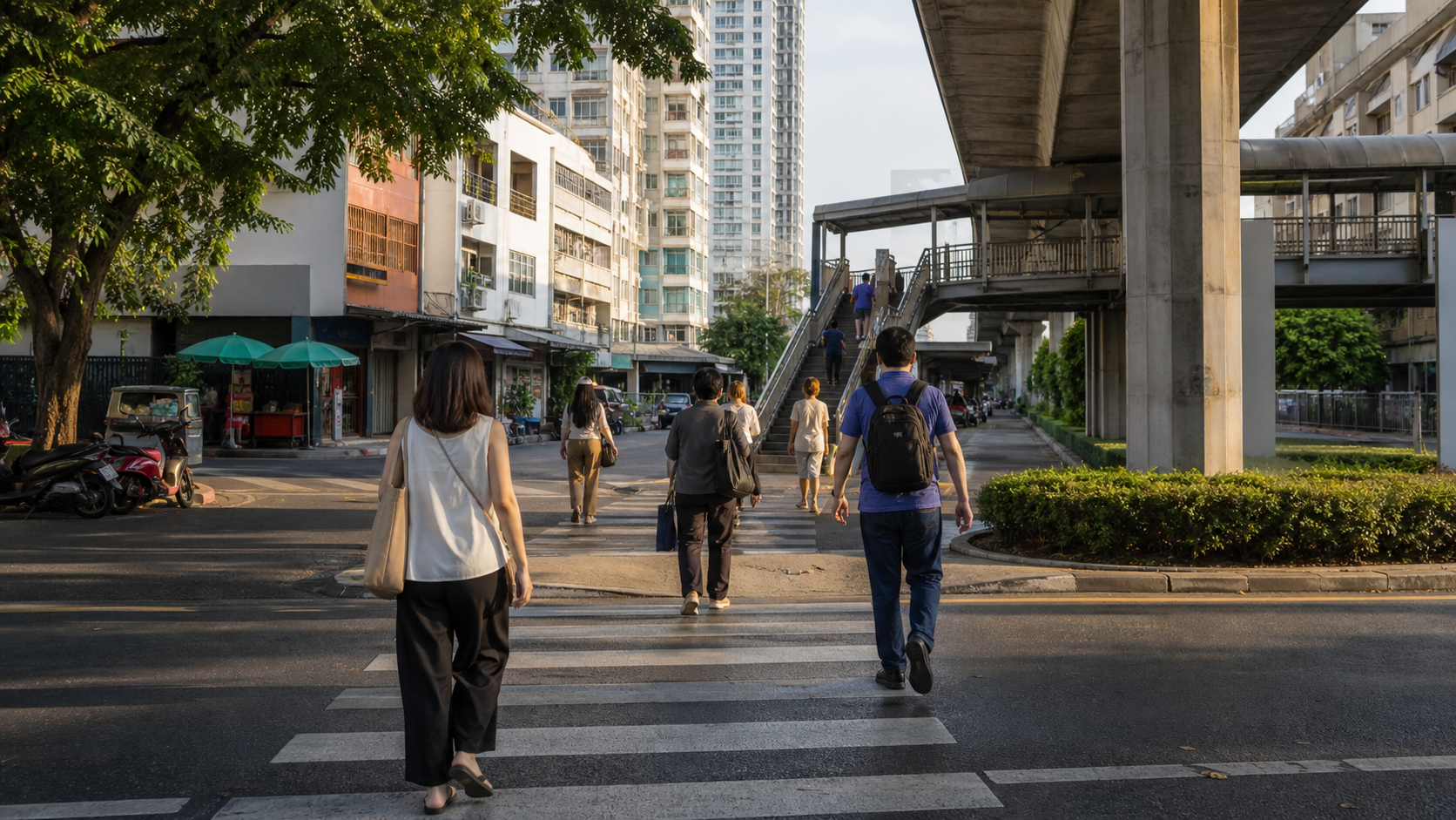 Illustrative Bangkok pedestrians crossing toward an elevated transit approach between apartments and neighborhood shops.