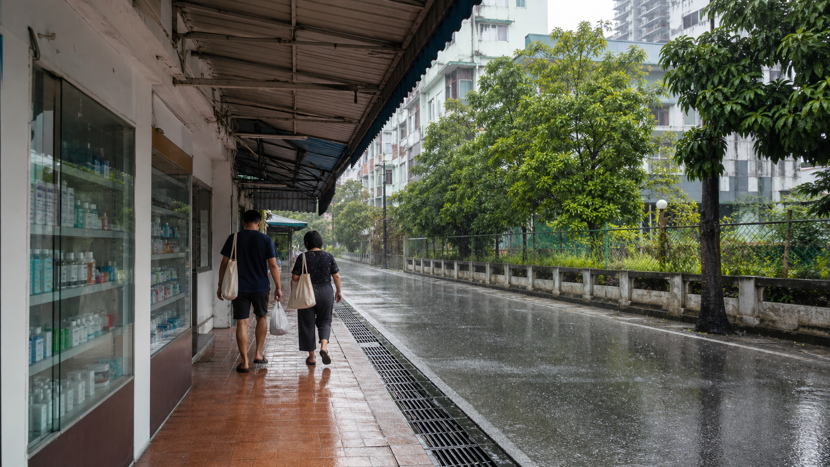 Illustrative covered Penang sidewalk during tropical rain with a generic pharmacy window, apartment buildings, pedestrians with bags, and visible drainage.