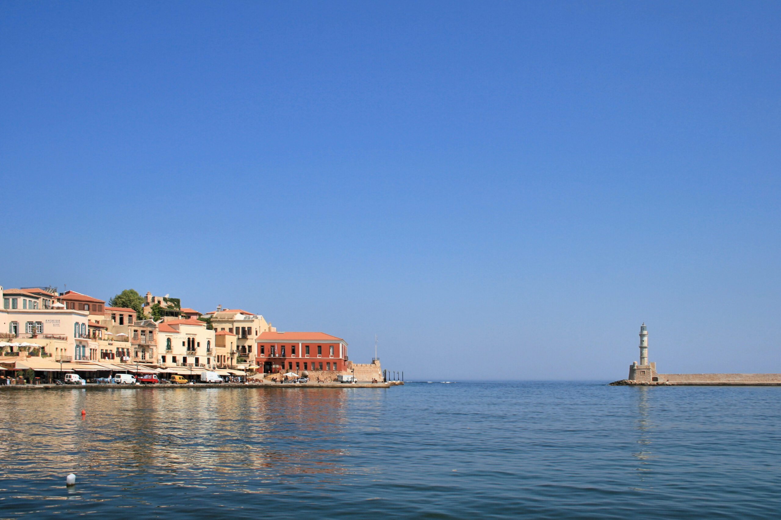 Boats and the Venetian harbor in Chania, Crete, Greece.